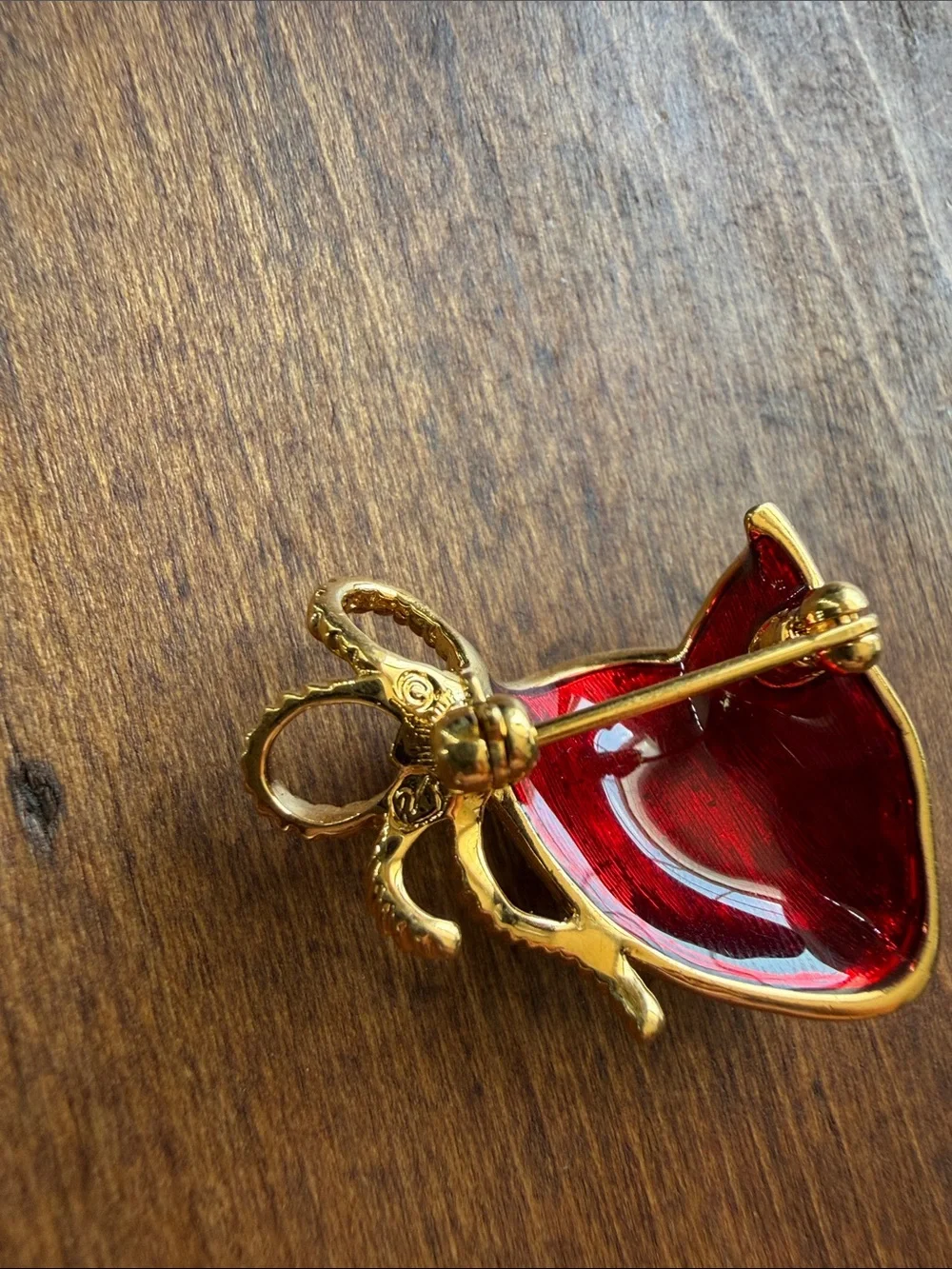 vintage 1990s Swarovski masquerade mask brooch features a pave-set crystal face